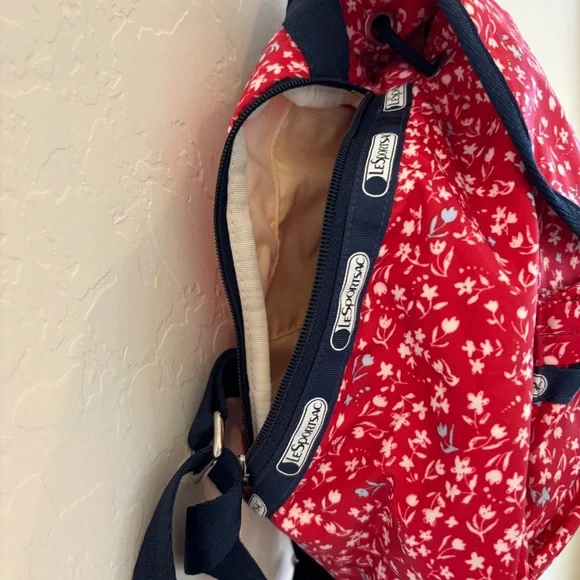 LeSportsac Small Edie Backpack in red  with a white and blue floral pattern. - Picture 4 of 12